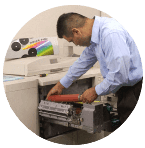 Man fixing a Printer for Xerox Print Services & Repair topic